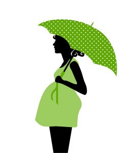 黄緑色のワンピースを着て傘を持つ横向きの妊婦のイラスト